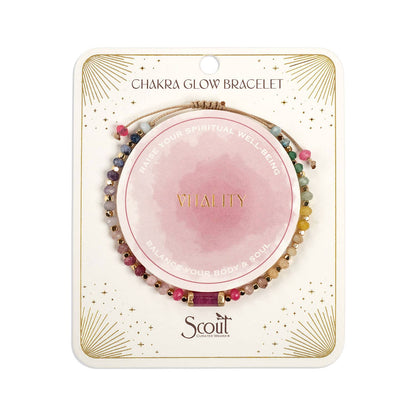 Chakra glow bracelet packaging with 'Vitality' and 'Scout' branding on a white background. Gallery images show this same piece from multiple angles and in styled settings.