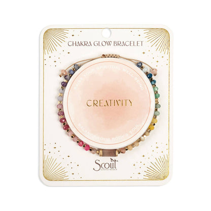 Chakra glow bracelet packaging with 'Creativity' on a white background
