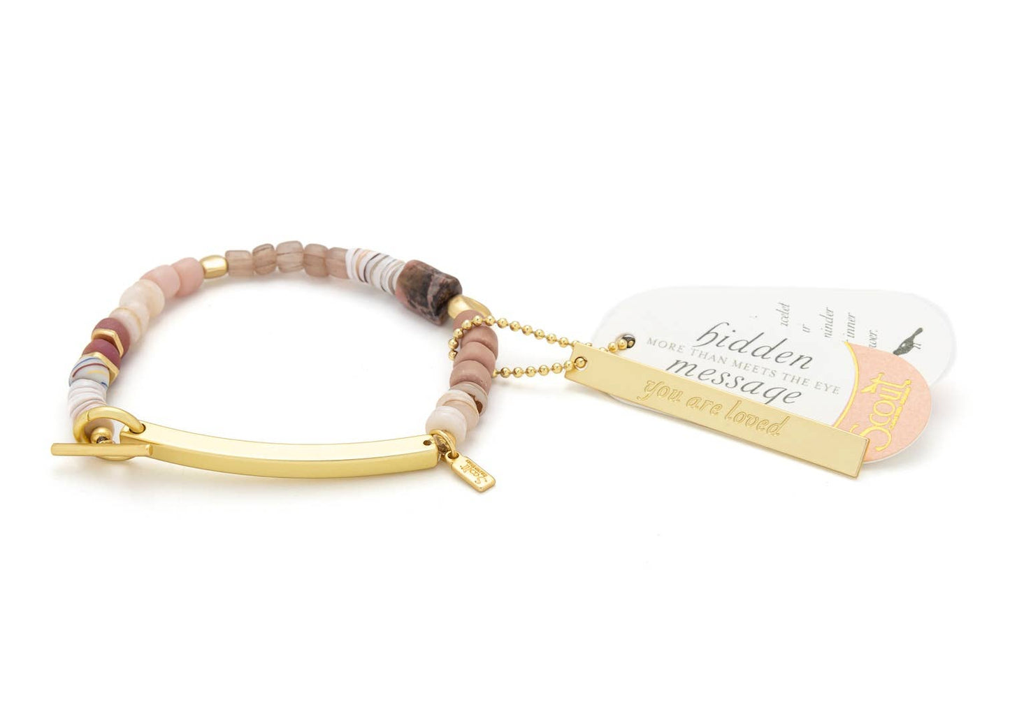 Bracelet with multicolored beads and gold bar, accompanied by a tag on a white background