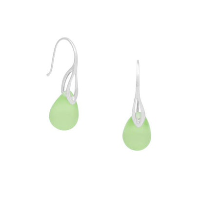 Pair of green teardrop earrings on white background