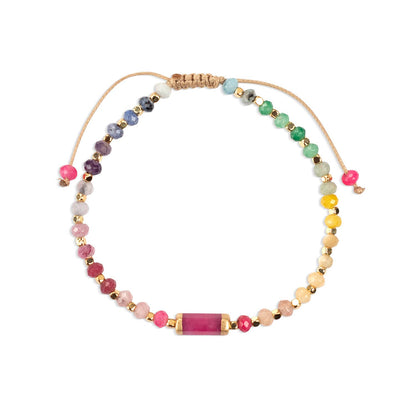 Multicolored beaded bracelet on a white background.
