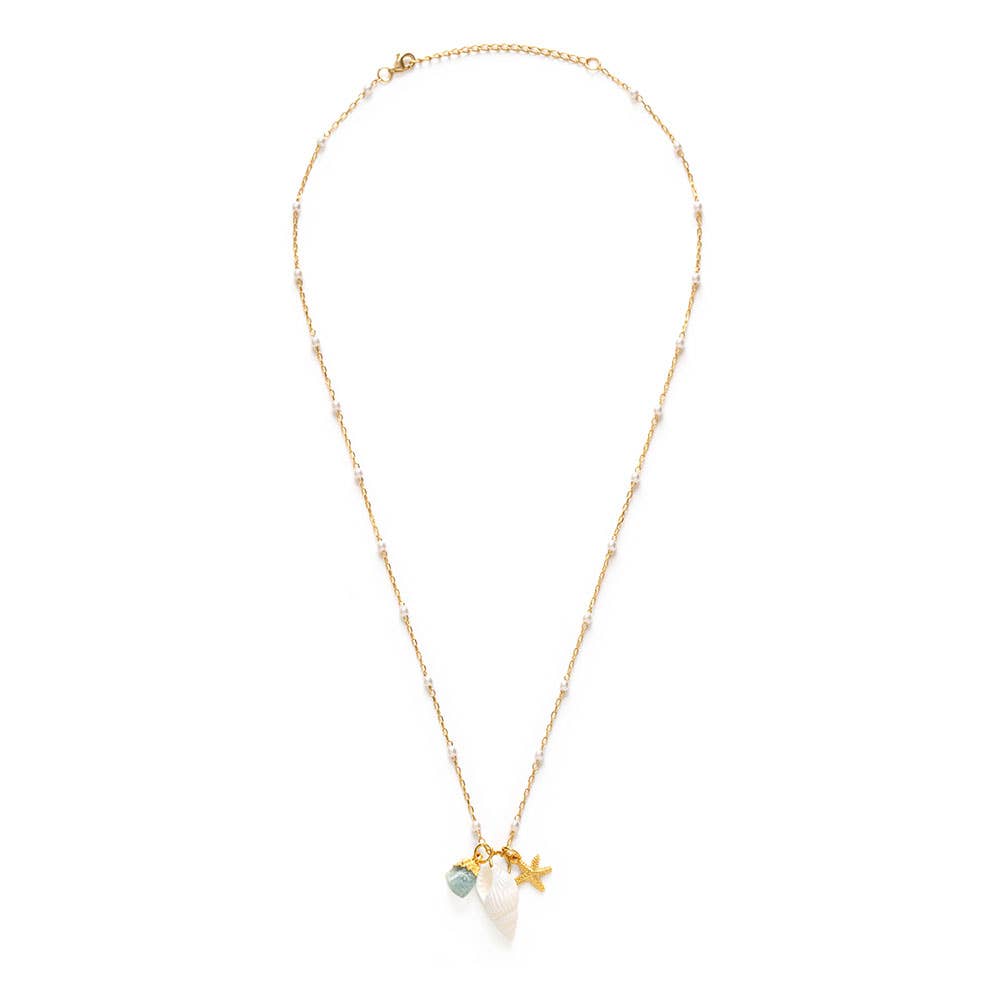 Necklace with star, shell, and gemstone pendants on a white background