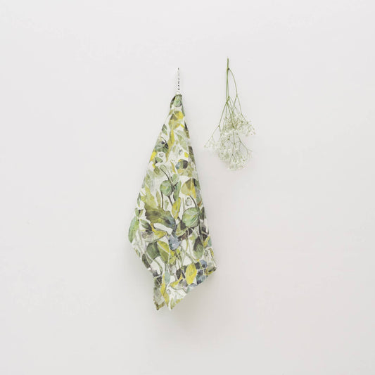 Floral-patterned fabric hanging on a white wall
