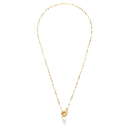Gold necklace with a small pendant on a white background