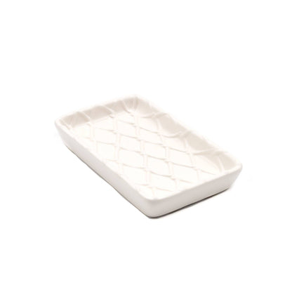Rectangular white ceramic soap dish.