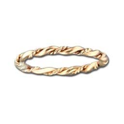 Gold ring with a twisted design on a white background