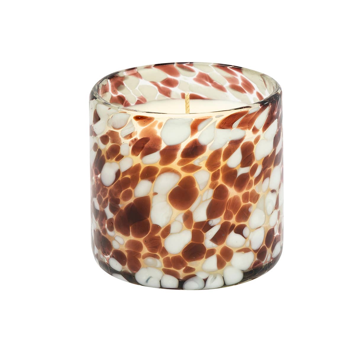 Candle in a glass container with a marbled pattern on a white background