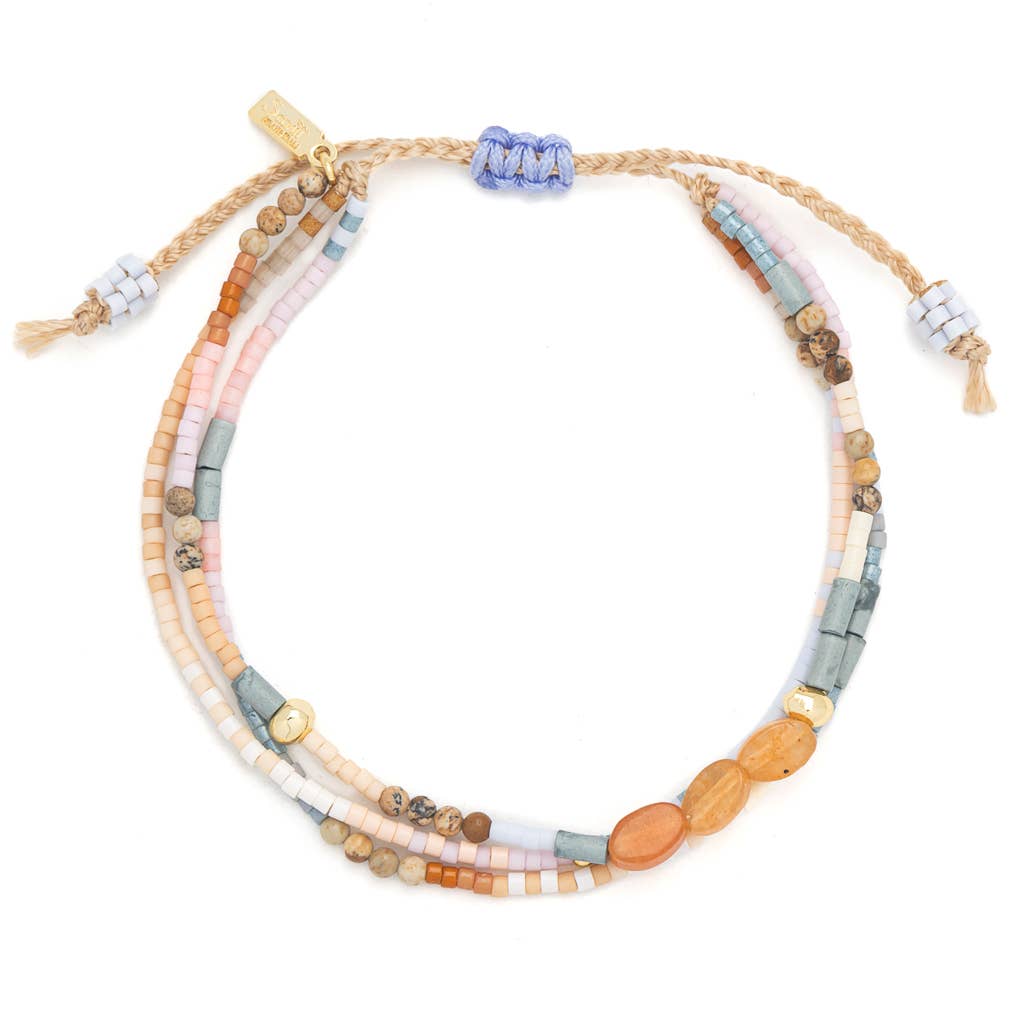Multicolored beaded bracelet on a white background