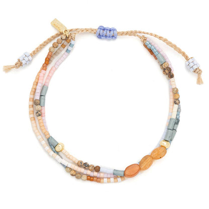 Multicolored beaded bracelet on a white background