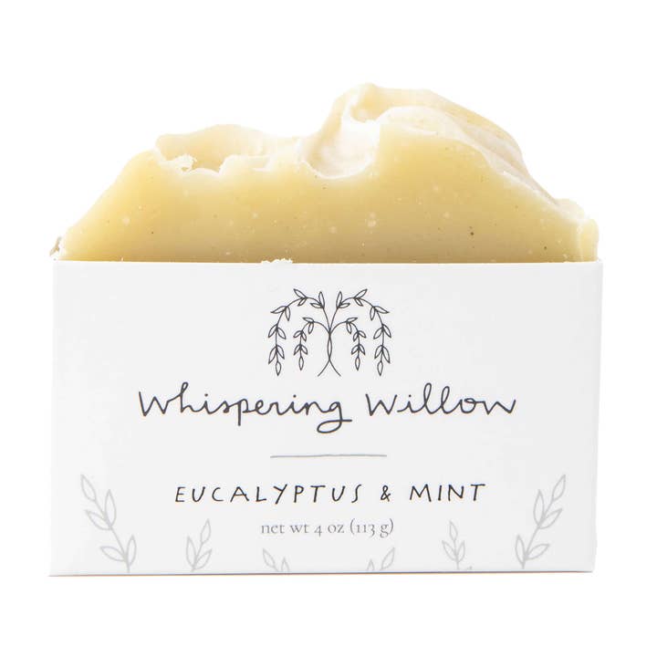 Bar of soap with 'Whispering Willow' packaging on a white background
