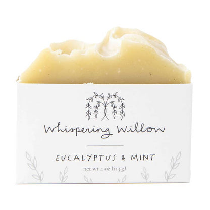 Bar of soap with 'Whispering Willow' packaging on a white background