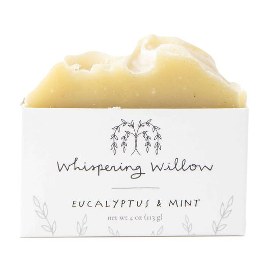 Bar of soap with 'Whispering Willow' packaging on a white background