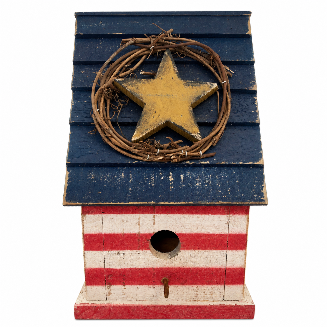 Birdhouse with blue roof with yellow star and striped red and white front on a white background.
