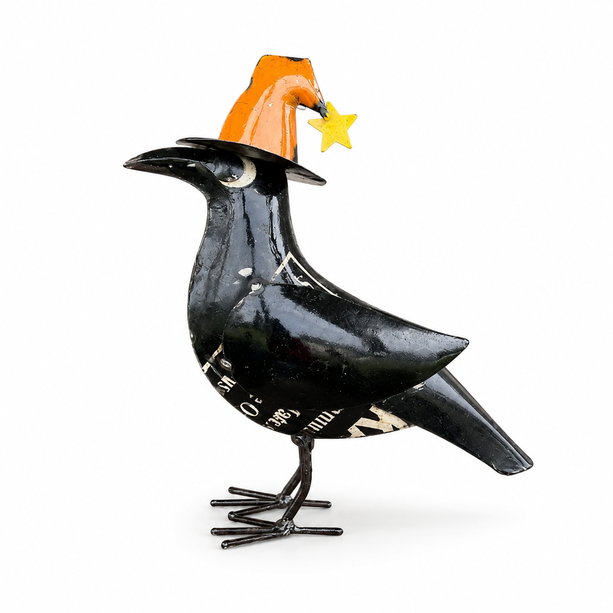 Black bird figurine with an orange hat and yellow star on a white background