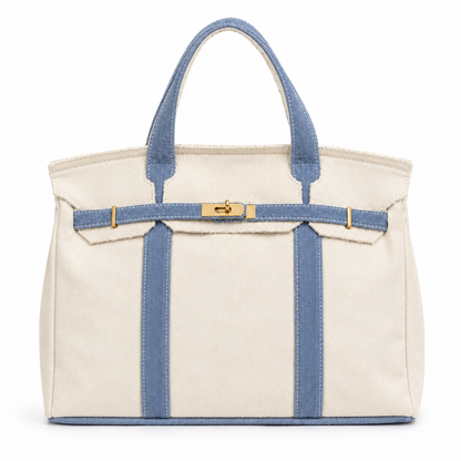 White tote bag with blue straps and trim on a white background