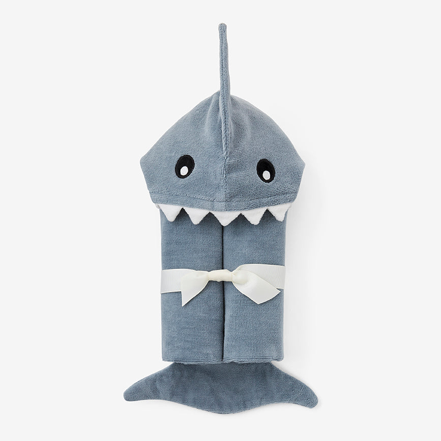 Blue shark-shaped hooded towel on a white background