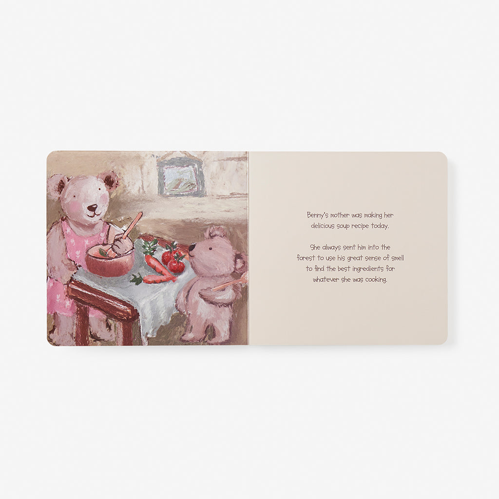 Illustrated book page with two teddy bears in a kitchen setting.