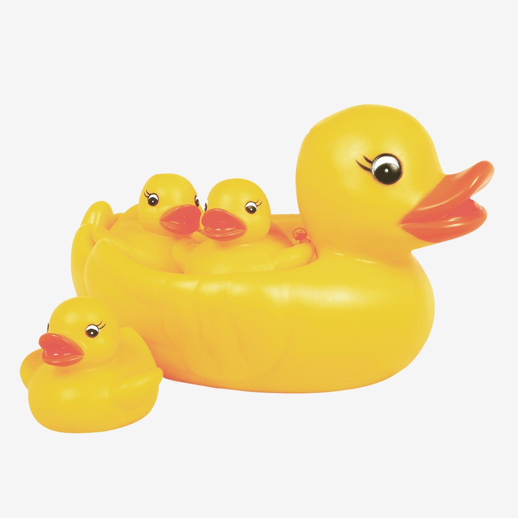 Set of yellow rubber ducks on a white background