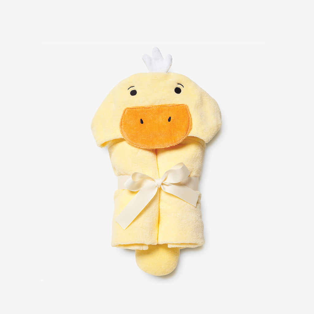 Yellow duck-shaped hooded towel with a white bow on a white background