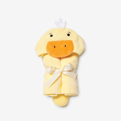 Yellow duck-shaped hooded towel with a white bow on a white background