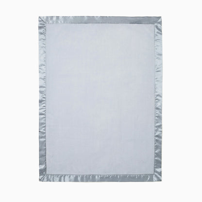 Light blue blanket with a textured border on a white background
