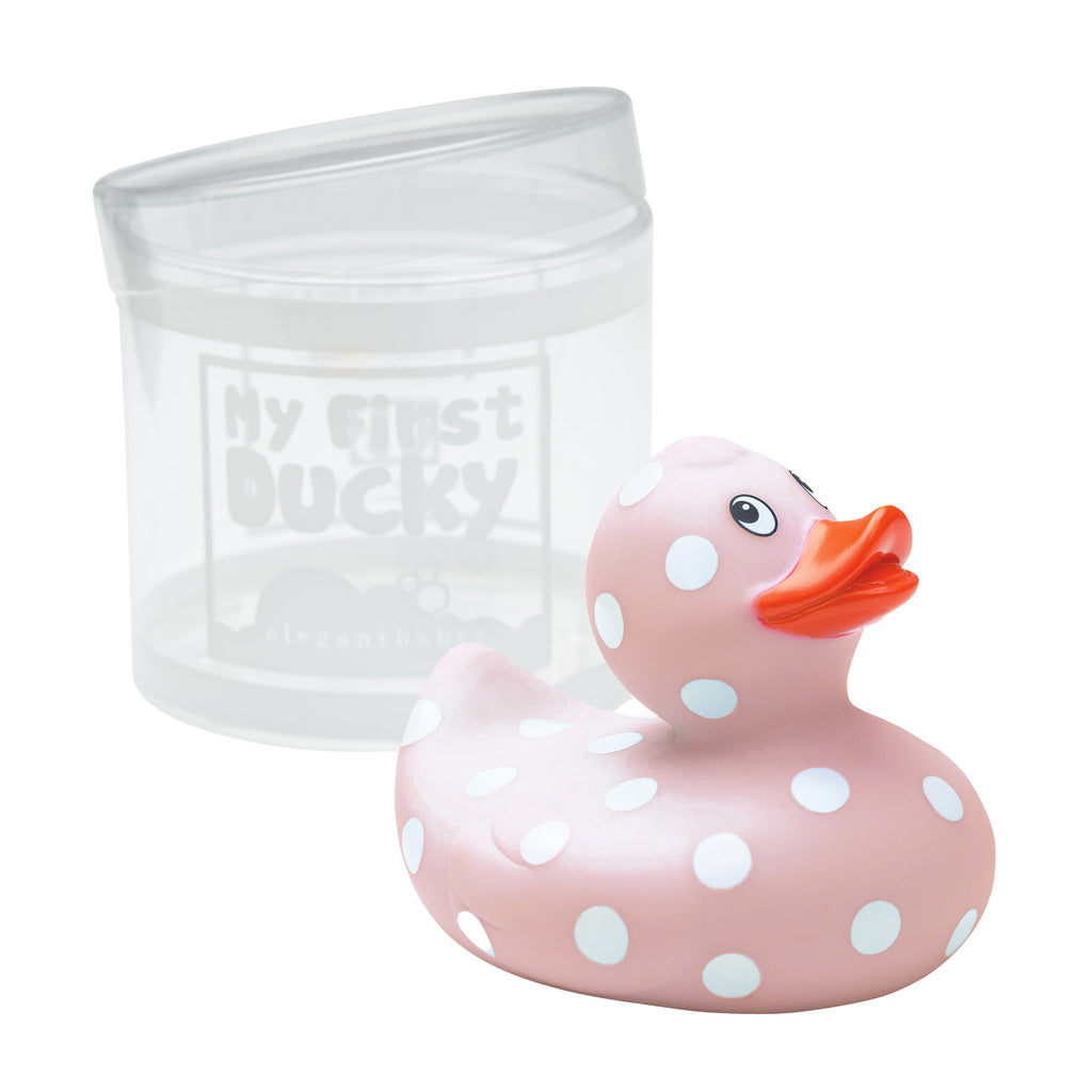 Pink polka dot rubber duck with a clear container labeled 'My First Ducky' on a white background
