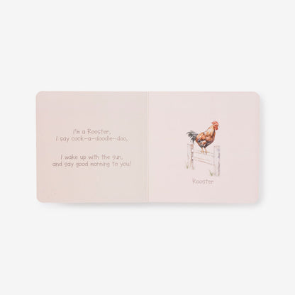 Open book with a rooster illustration and text on a light pink background