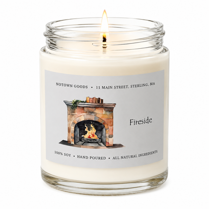 Clear jar candle with white wax and a decorative label on a white background.