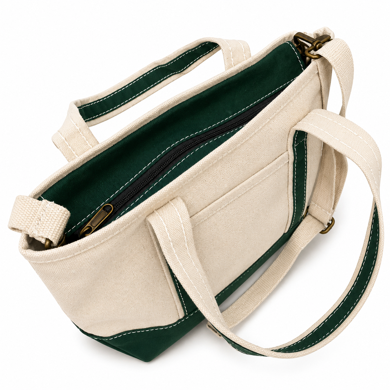 Beige tote bag with green interior and trim on a white background