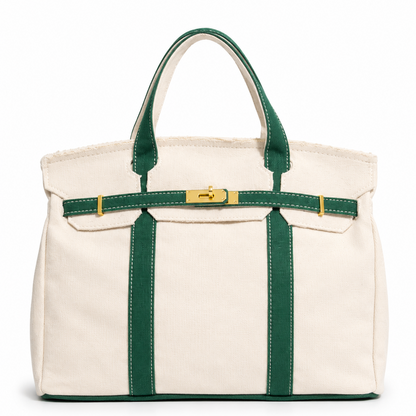 White tote bag with green straps on a white background