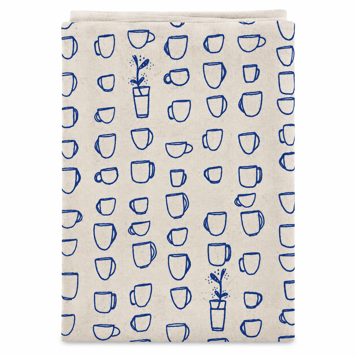 A cream colored tea towel with blue teacups design on a white background.