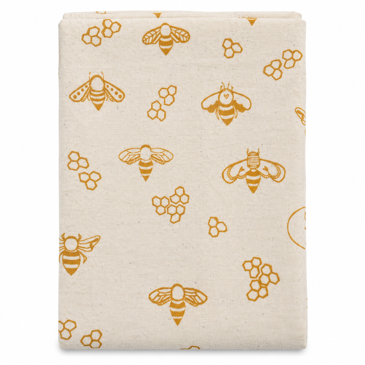 A cream colored tea towel with bee design printed in gold on a white background.