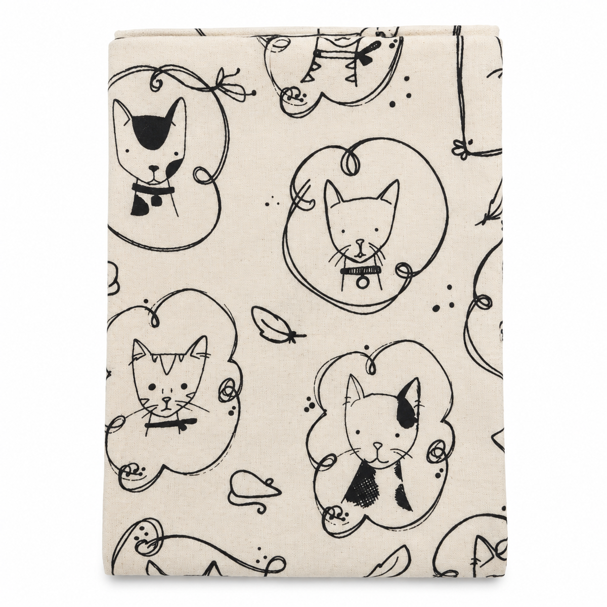A cream colored tea towel with sketched cat design printed in black on a white background.