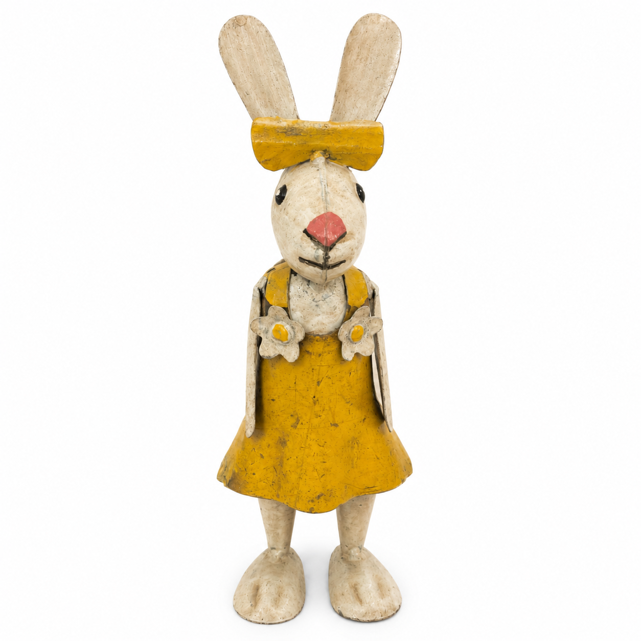 Metal white bunny sculpture wearing a yellow bow and yellow dress on a white background.