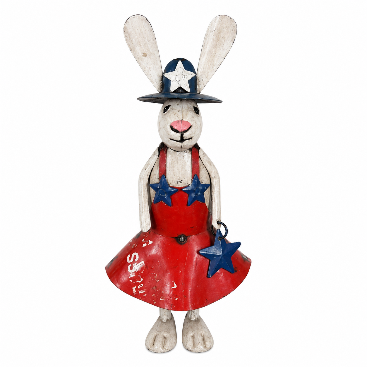 Decorative rabbit figurine wearing a red dress with blue stars and a black hat on a white background