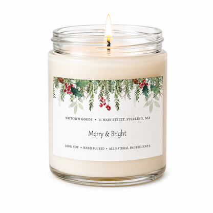 Clear jar candle with white wax and a decorative label on a white background.