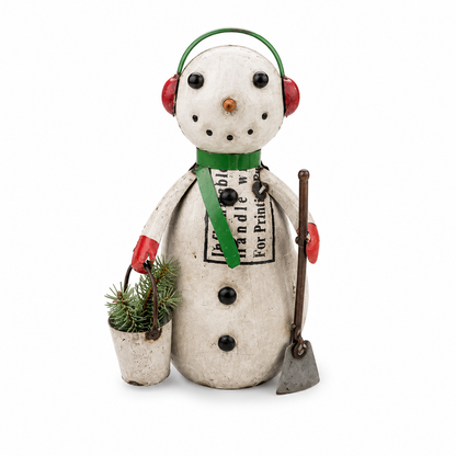 Decorative snowman figurine with a pail of greenery and a shovel on a white background