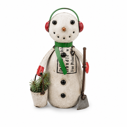 Decorative snowman figurine with a pail of greenery and a shovel on a white background