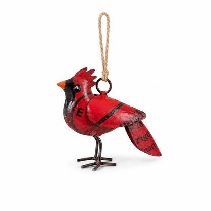 Red cardinal ornament on a white background.