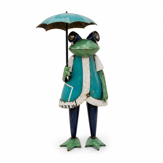 Frog figurine in a coat holding an umbrella on a white background