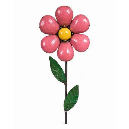Pink daisy garden stake with yellow center and green stem and leaves on a white background.