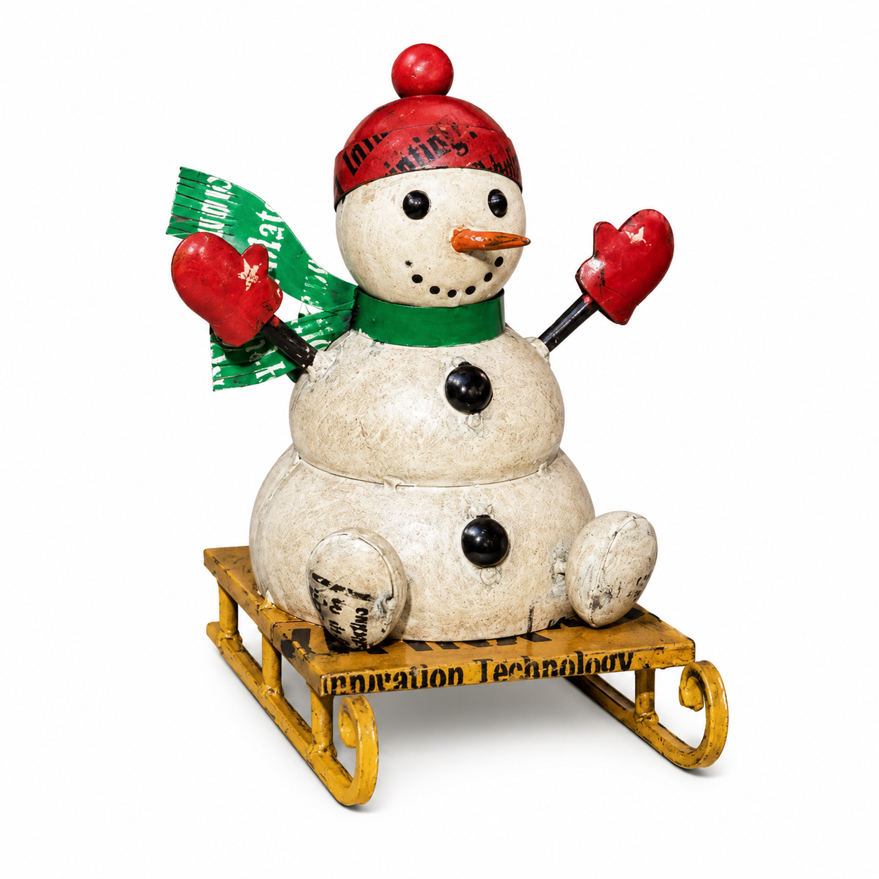 Snowman figurine with red hat, green scarf, and red gloves on a yellow sled with text.