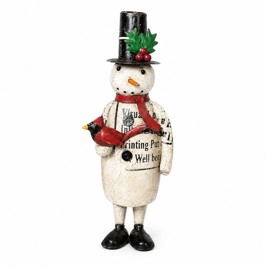 Decorative snowman figurine with a red cardinal, top hat, and newspaper outfit on a white background