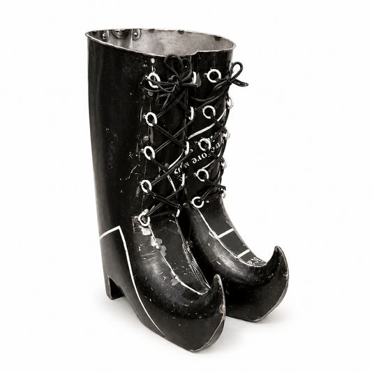 Metal pair black high-heeled boots decoration with laces on a white background