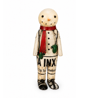  Snowman figurine with a red scarf and green mittens on a white background.