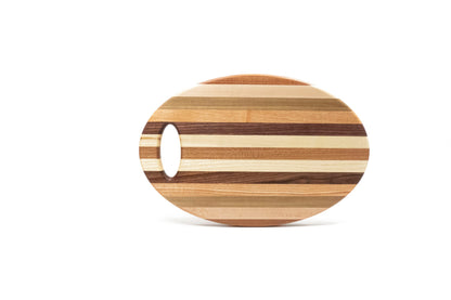 Oval wooden cutting board with a handle on a white background