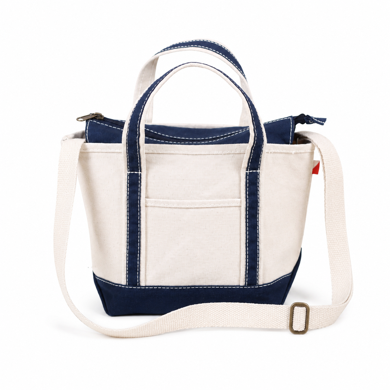 Canvas handbag with navy accents on a white background