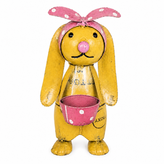 Metal Bunny sculpture with pink ribbon headband and holding a pink bucket on a white background.
