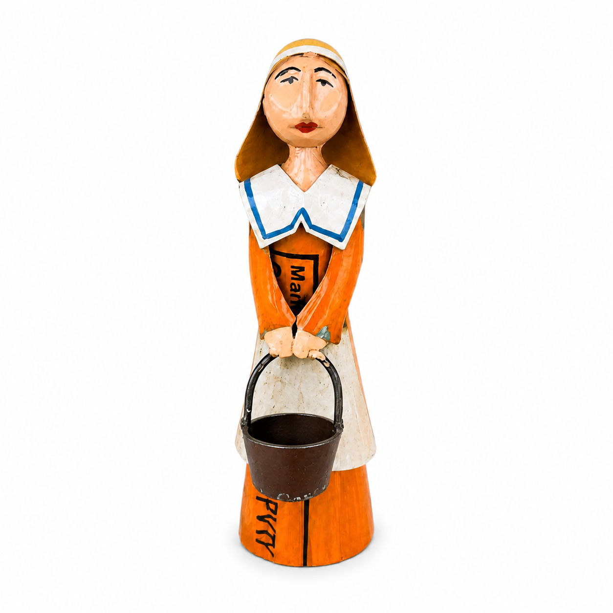 Figurine of a female pilgrim in an orange dress holding a black bucket on a white background