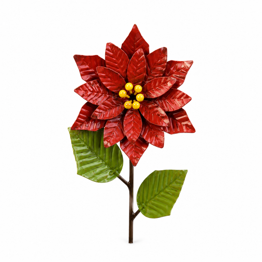 Red poinsettia flower with green leaves on a white background
